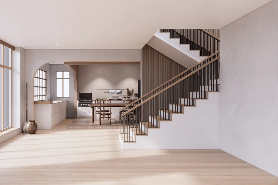 Offener Wohnraum mit Treppe, dunklem Metallgeländer und hellem Holzboden.